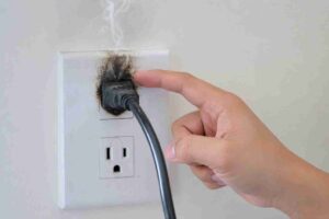 Is It Dangerous If a Plug Gets Warm 1 - Electrician Abilene Is It Dangerous If a Plug Gets Warm